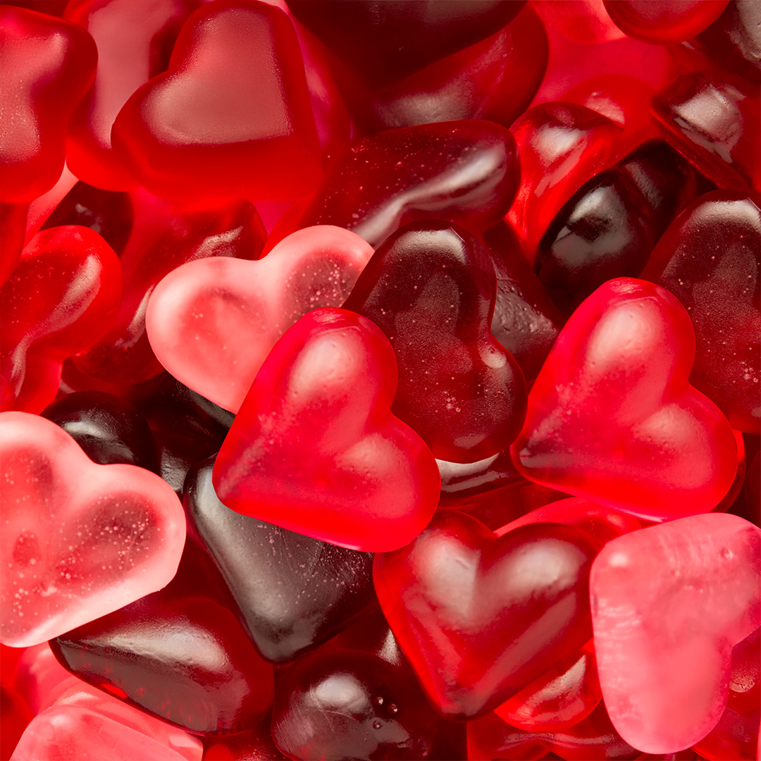 red popscicles stacked on surface