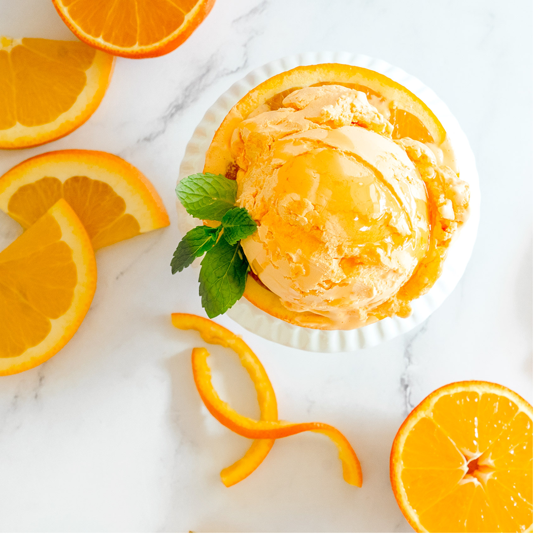 orange ice cream in a bowl
