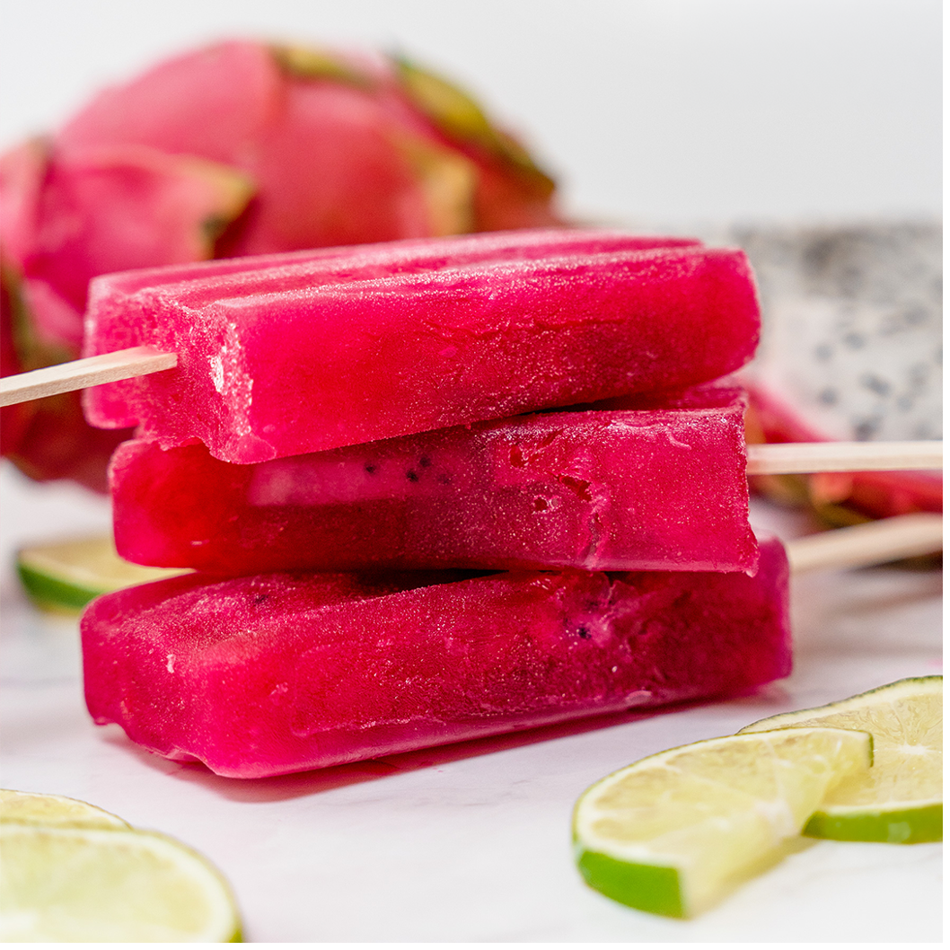 red popscicles stacked on surface